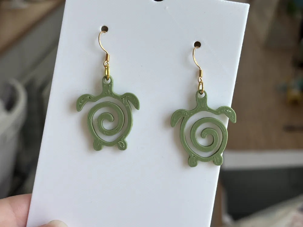 3D printed line art Sea turtle earrings by FOFUS