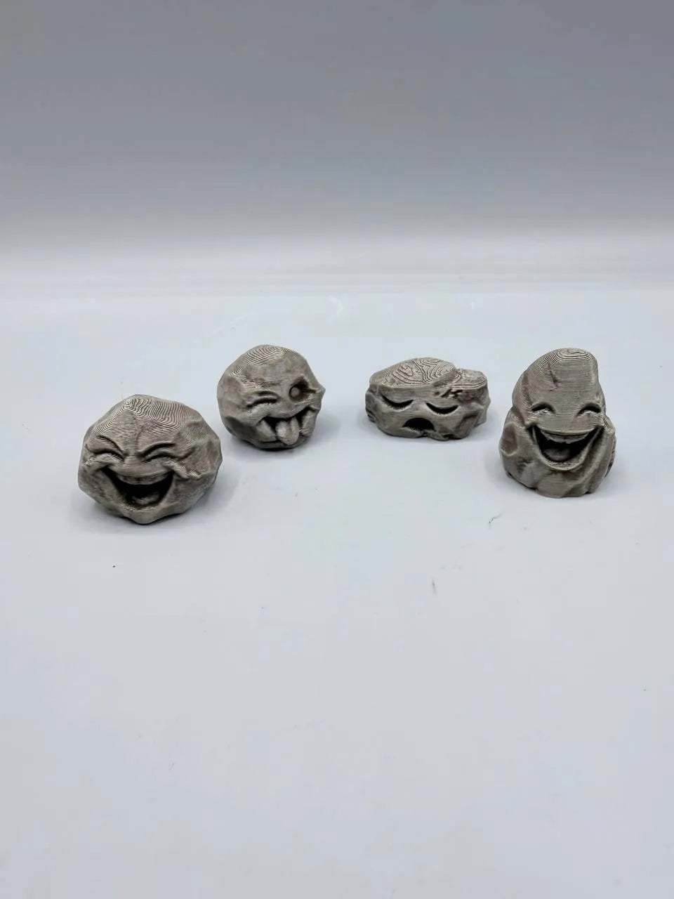 Happy Stones – 3D Printed Decorative Smiley Pebble Set
